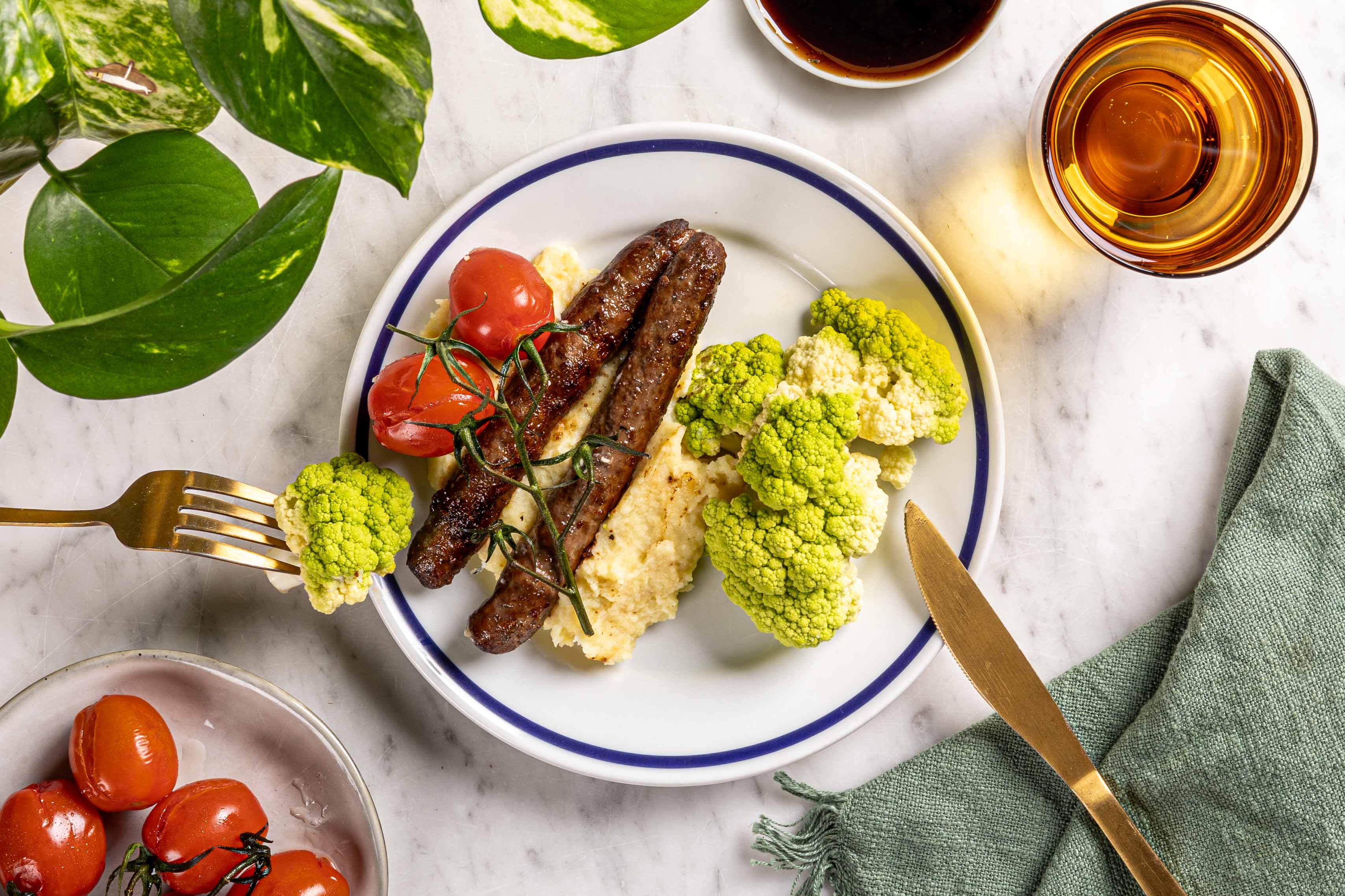 Chipolataworstjes met romanesco en aardappelpuree