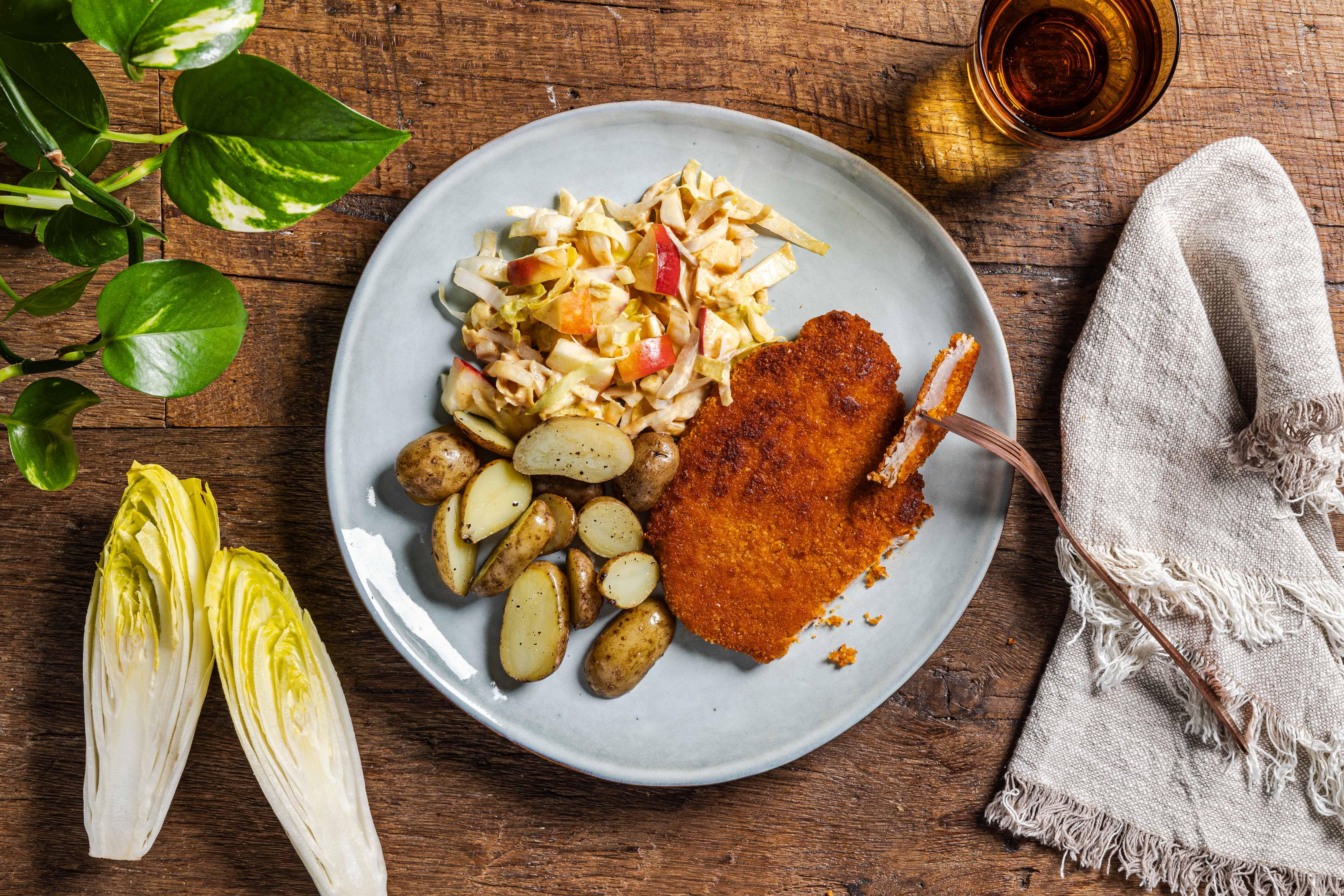 Schnitzel met kriel en witlofsalade