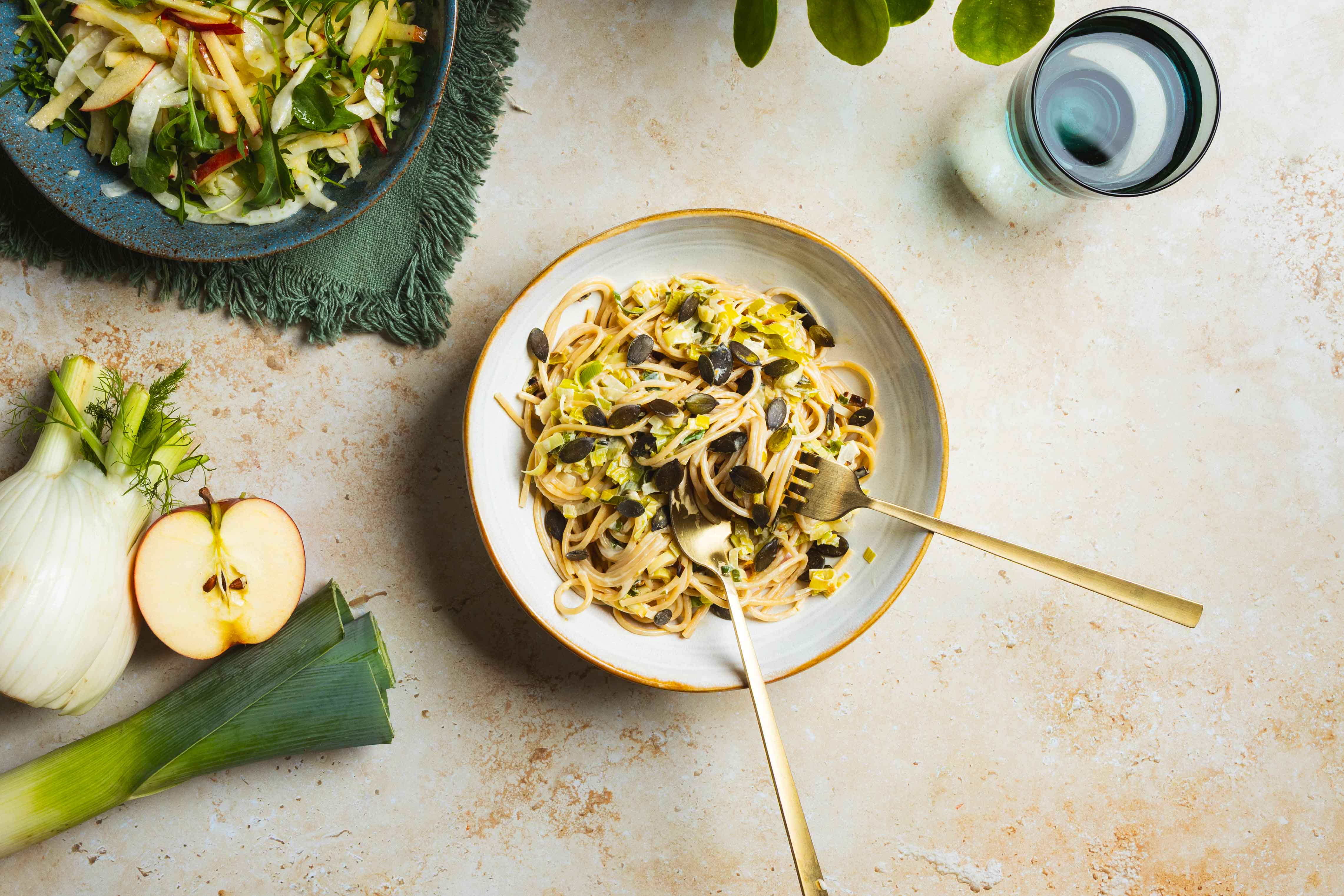 Spaghetti met preisaus en pompoenpitten