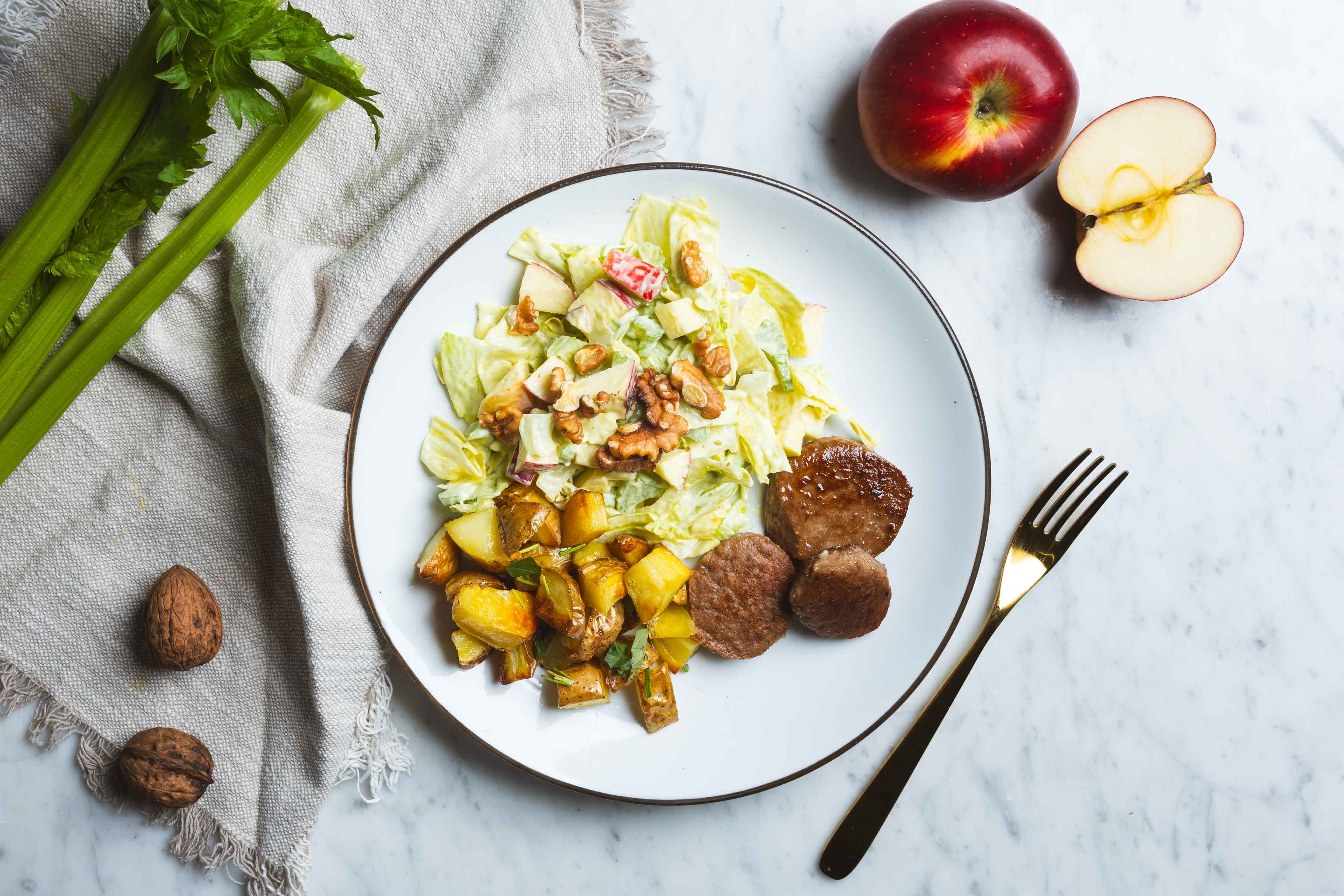 Vega burger met ovenaardappeltjes